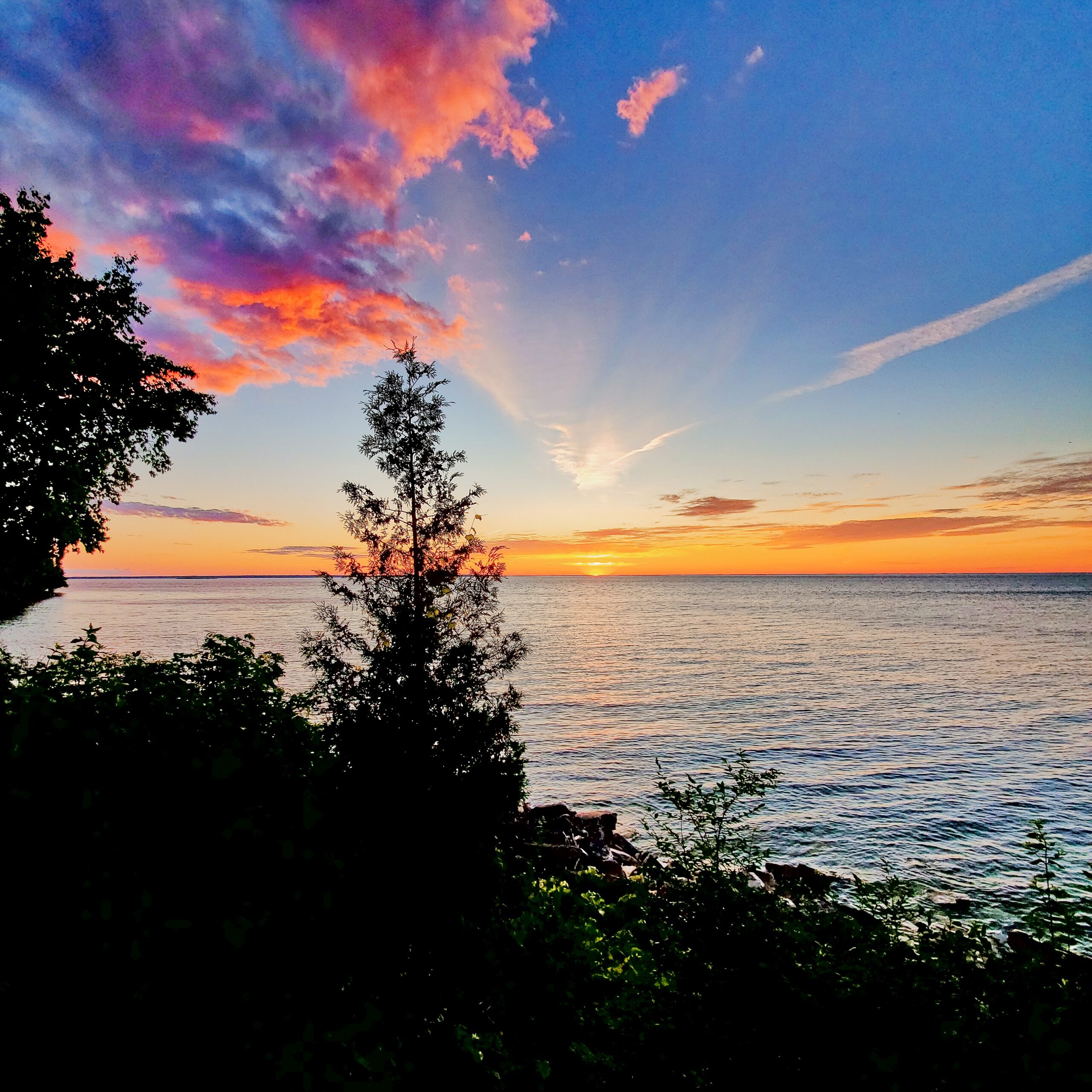 Cloudy sunset on the water in Peninsula State Park