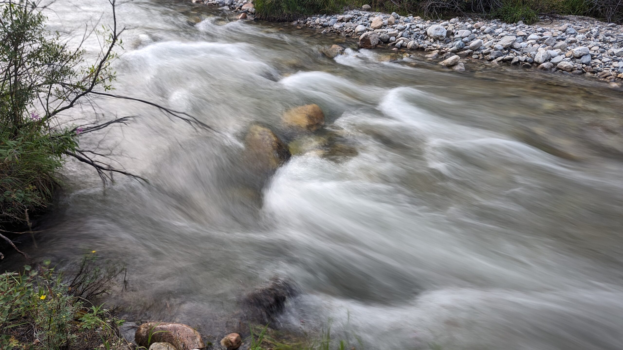 A blurred vision of water passing by in a creek